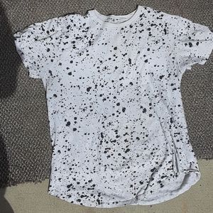 Black and white paint splattered shirt.